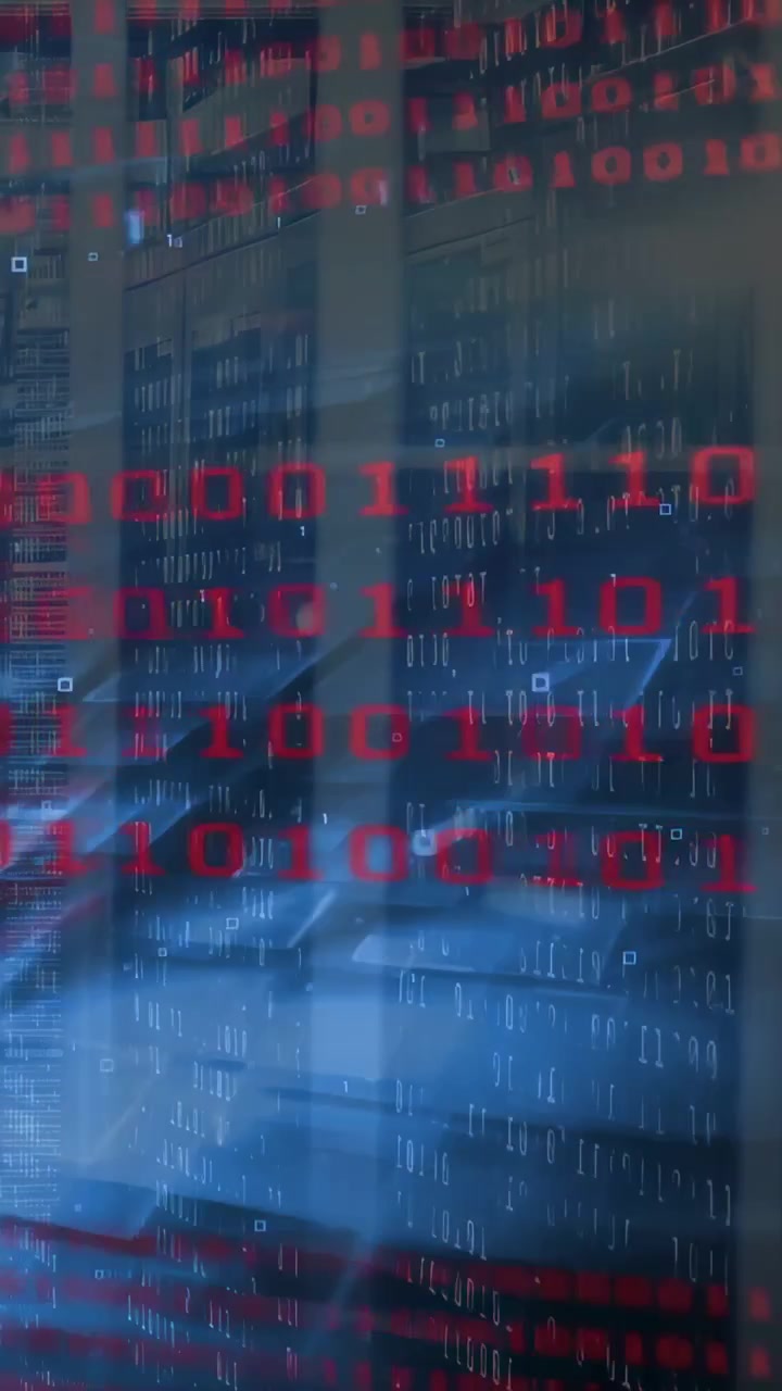 Vertical video: Hooded person monitoring racks, pulse firing red binary overlaying frame, aiding IT