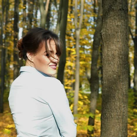elegant woman walking in a park