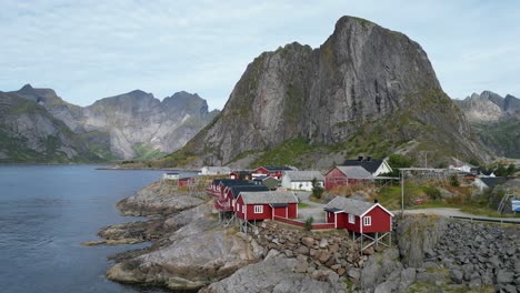 red cabin houses 'rorbuer' at hamnoy village, lofoten islands, norway - pan left