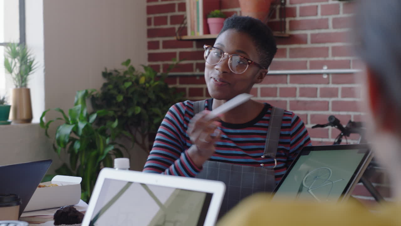 creative team of engineers using tablet computer designing bicycle prototype african american business woman presenting design on screen planning project sharing ideas in office meeting