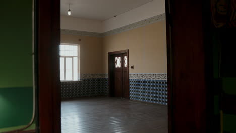 empty historical room with decorative tiles and trim
