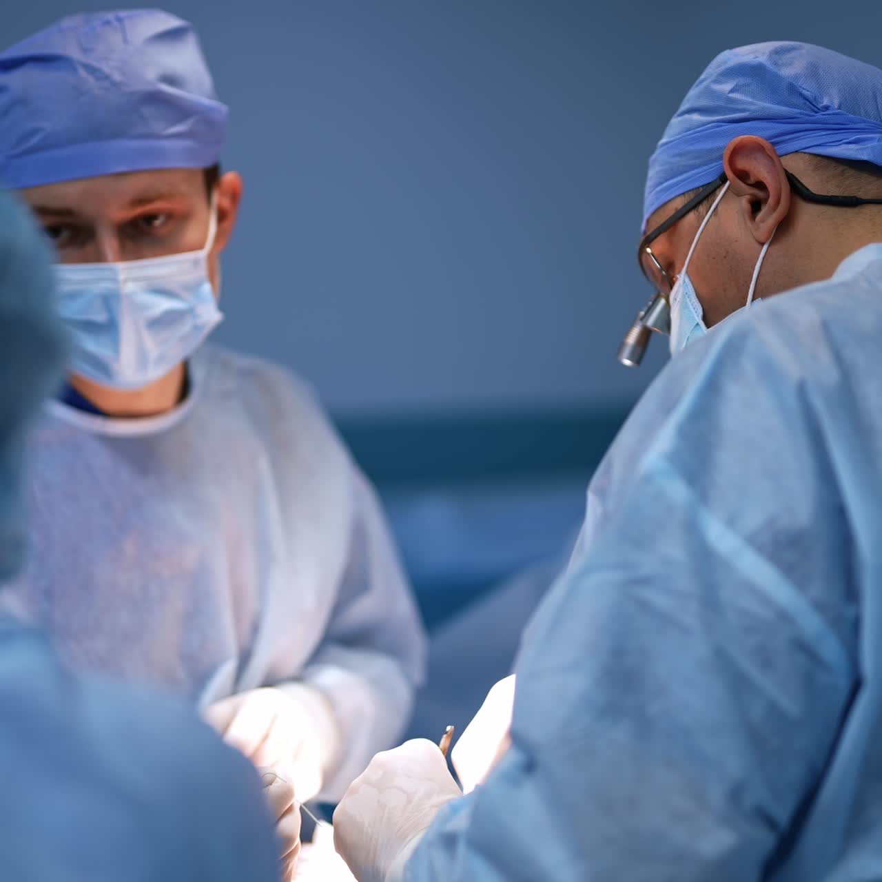 New technology emergency operating doctor. Process of surgery specialist working in modern hospital ward