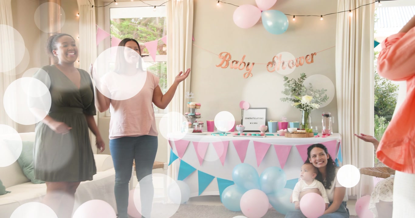 Pal guiding mom covering eyes into baby shower, surprising mom as lens flares revealing balloons