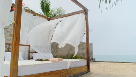 massage products over a beach bed