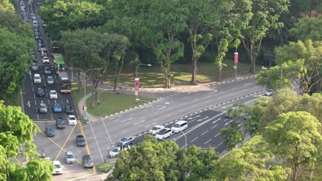 city intersection with traffic congestion and park