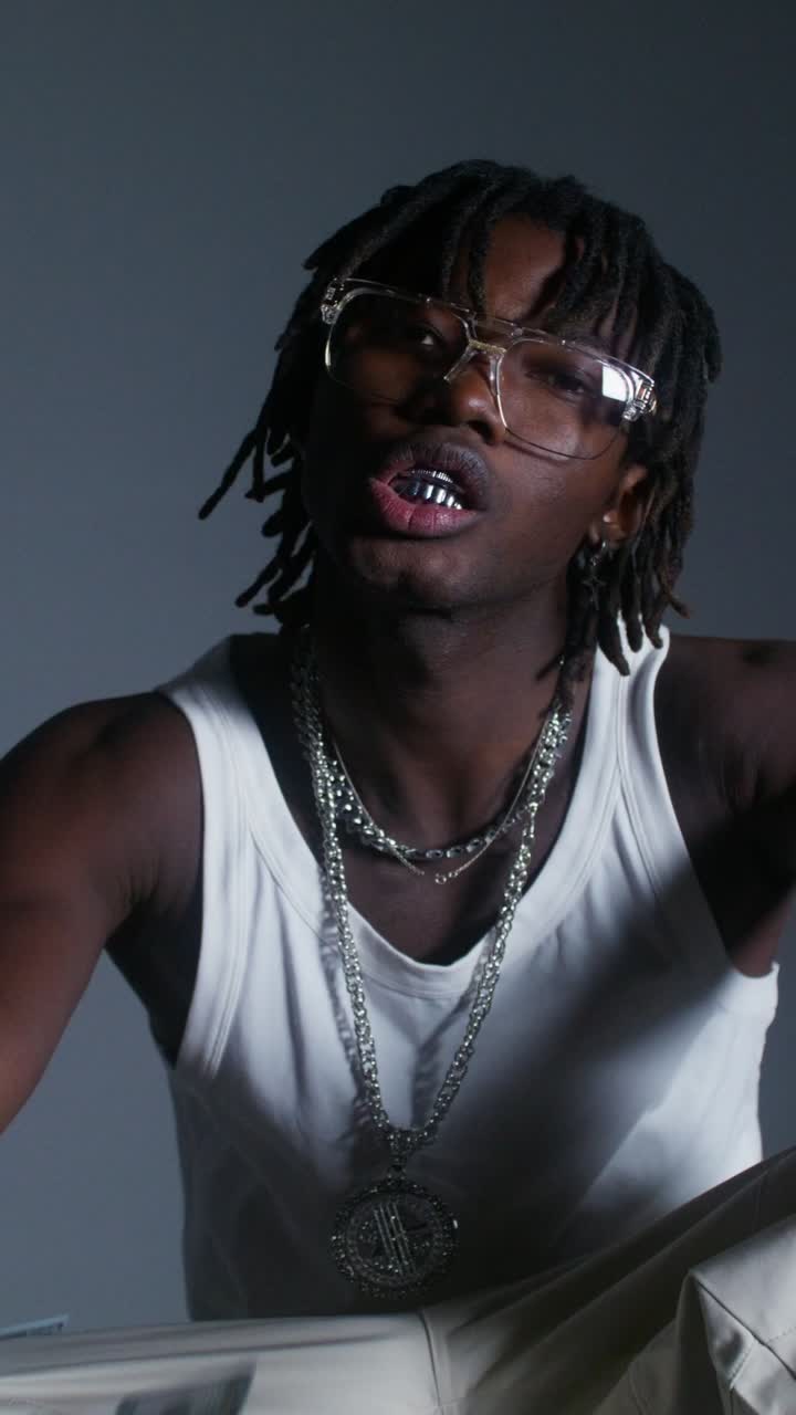 Stylish Young Man with Expensive Jewelry and Money