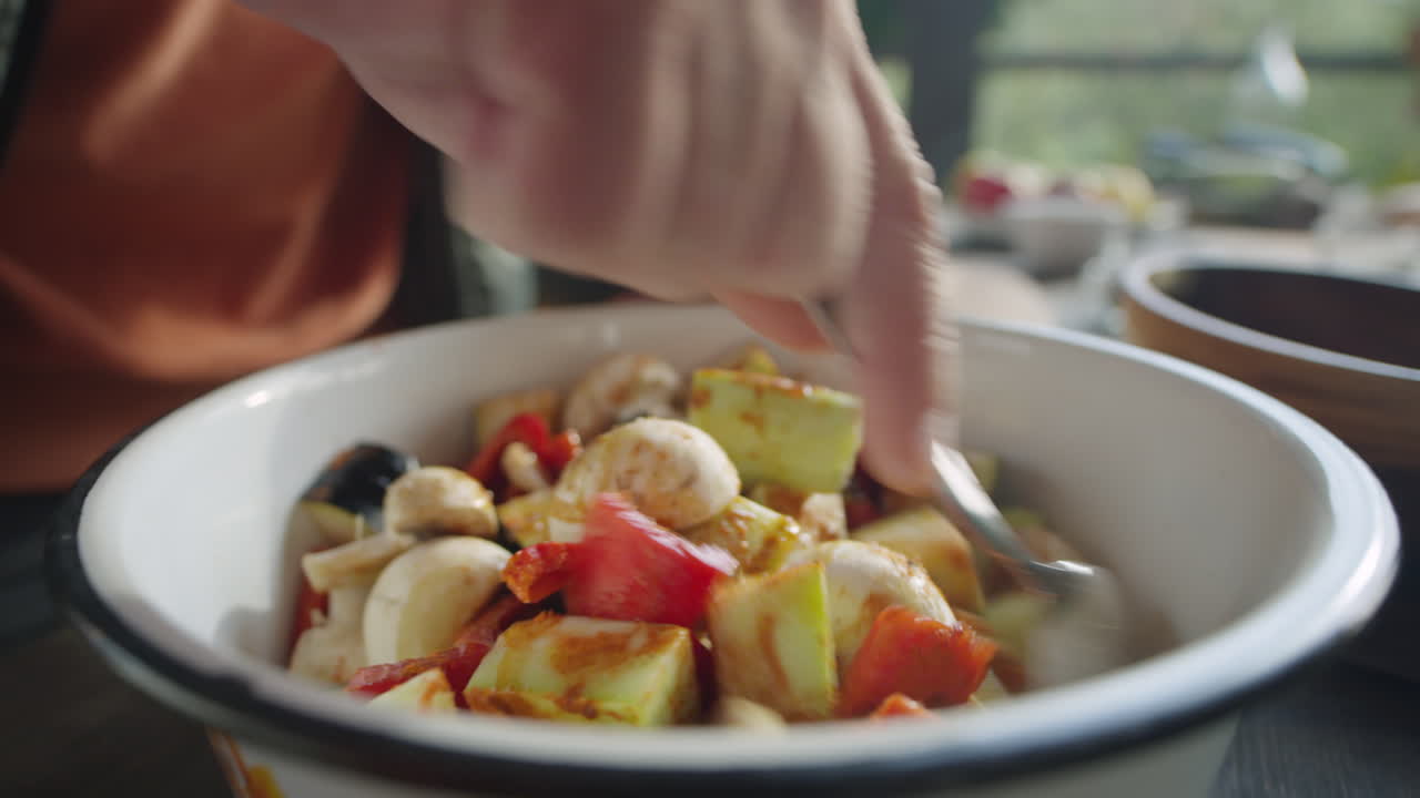 Mixing Vegetables in Bowl before Cooking
