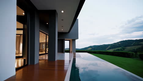 modern luxury home with infinity pool and hillside views