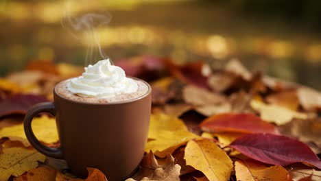 a warm cup of comfort: steaming hot chocolate with whipped cream surrounded by colorful autumn leaves, capturing the essence of cozy fall days