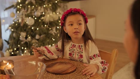 mother and daughter preparing for christmas celebration