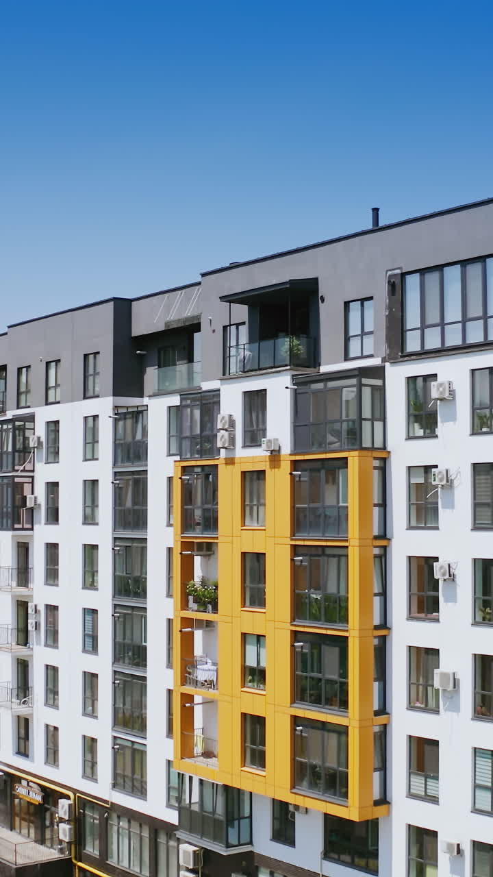 View of new apartment building. Aerial view of modern residential complex for young families