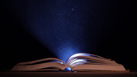 glowing open book