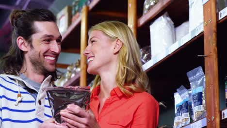 happy couple shopping for groceries