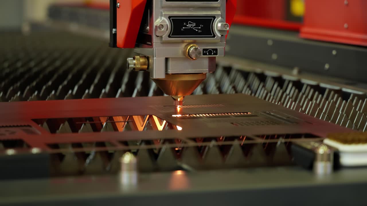 CNC Laser cutting of metal, modern industrial technology.