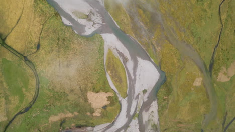 Glencoe's-winding-rivers-and-lush-green-landscape-in-scotland,-aerial-view