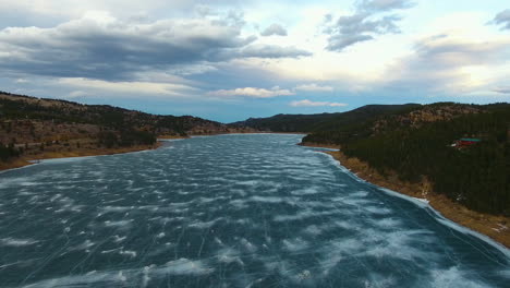 drone footage in nederland colorado over a frozen barker meadows reservoir