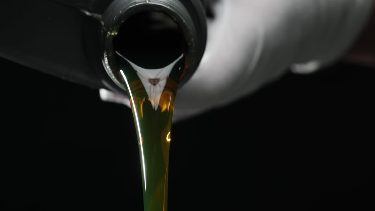 Pouring Motor Oil