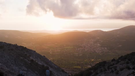 sunset over mountain valley