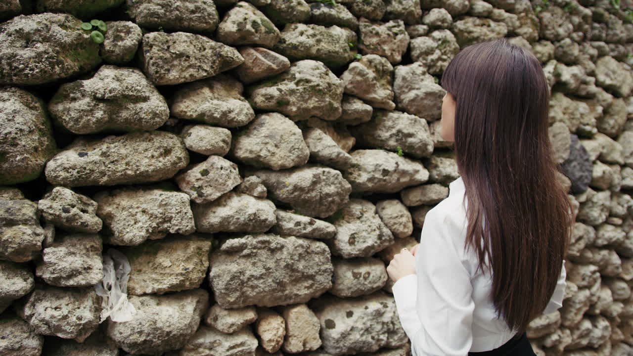 Woman Reading A Prayer In Front Of The Sacred Old Wall