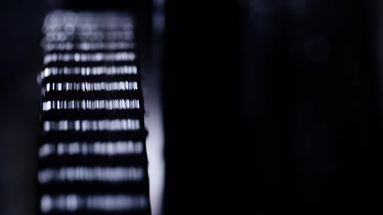 Old grinding machine and wheel in workshop or small factory blur background