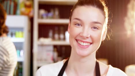 Waitress-holding-a-tray-of-cake