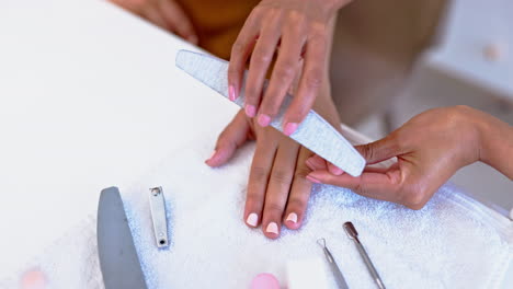 hands on woman at spa, manicure