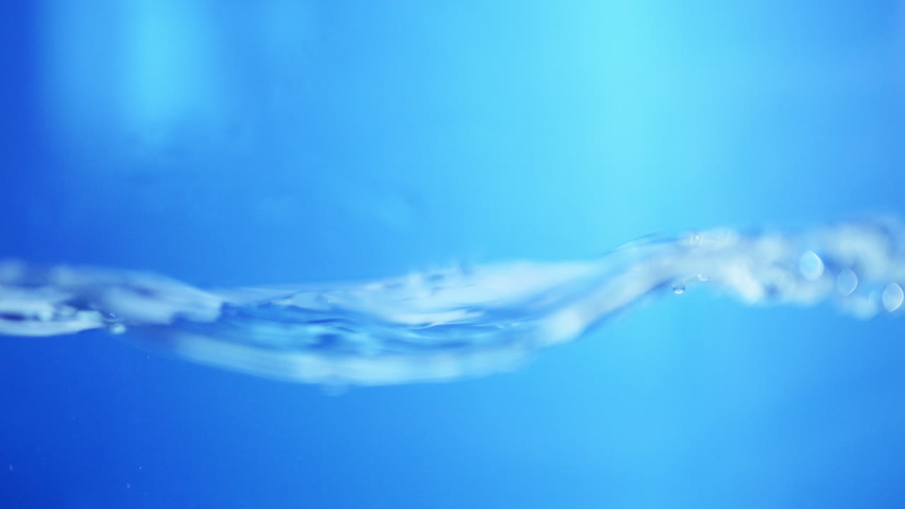 Water Wave on Blue Background