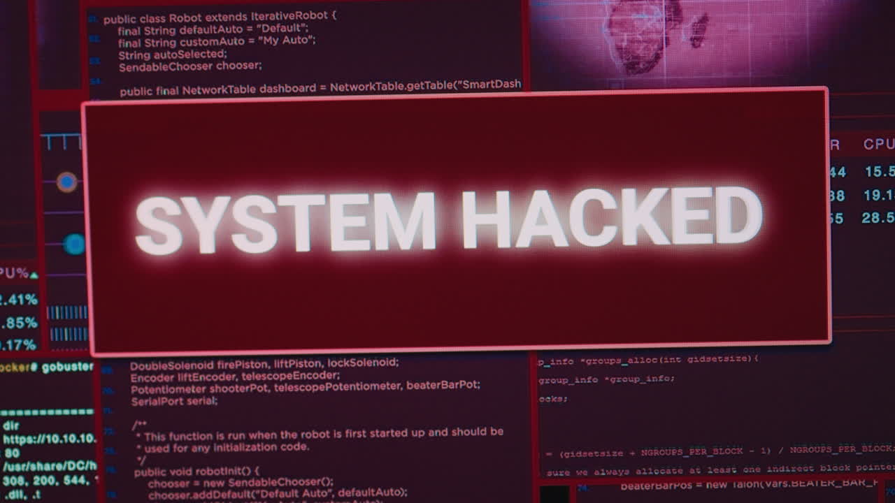 Software developer computer showing hacking attack alert with security breach