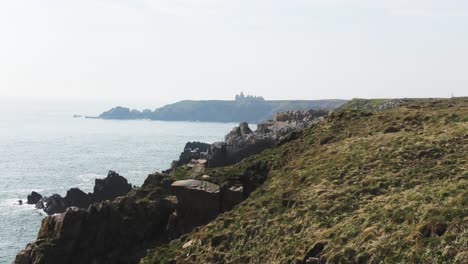 buchan coast with slains castle ruin in the distance