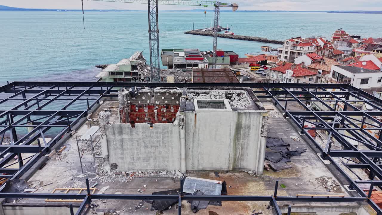 Building under construction shows exposed walls and incomplete structure