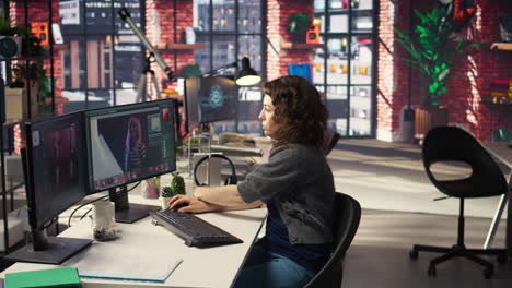 female editor designer retouches photos on dual monitors desktop