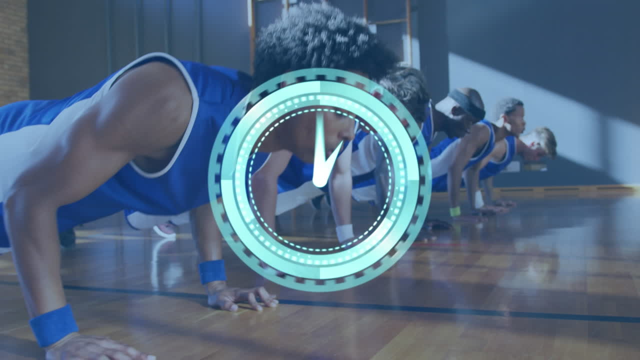 animación del reloj sobre un equipo masculino diverso haciendo bombas en la cancha