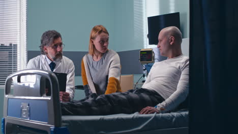 doctor discussing patient's condition in hospital