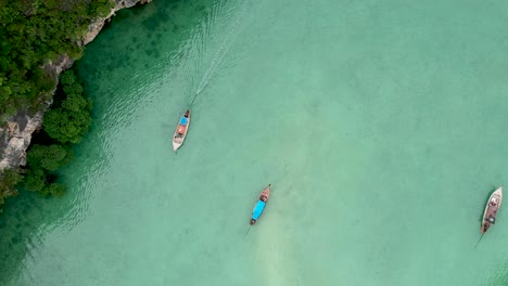 drone footage of hong island lagoon with boats navigating trough-9