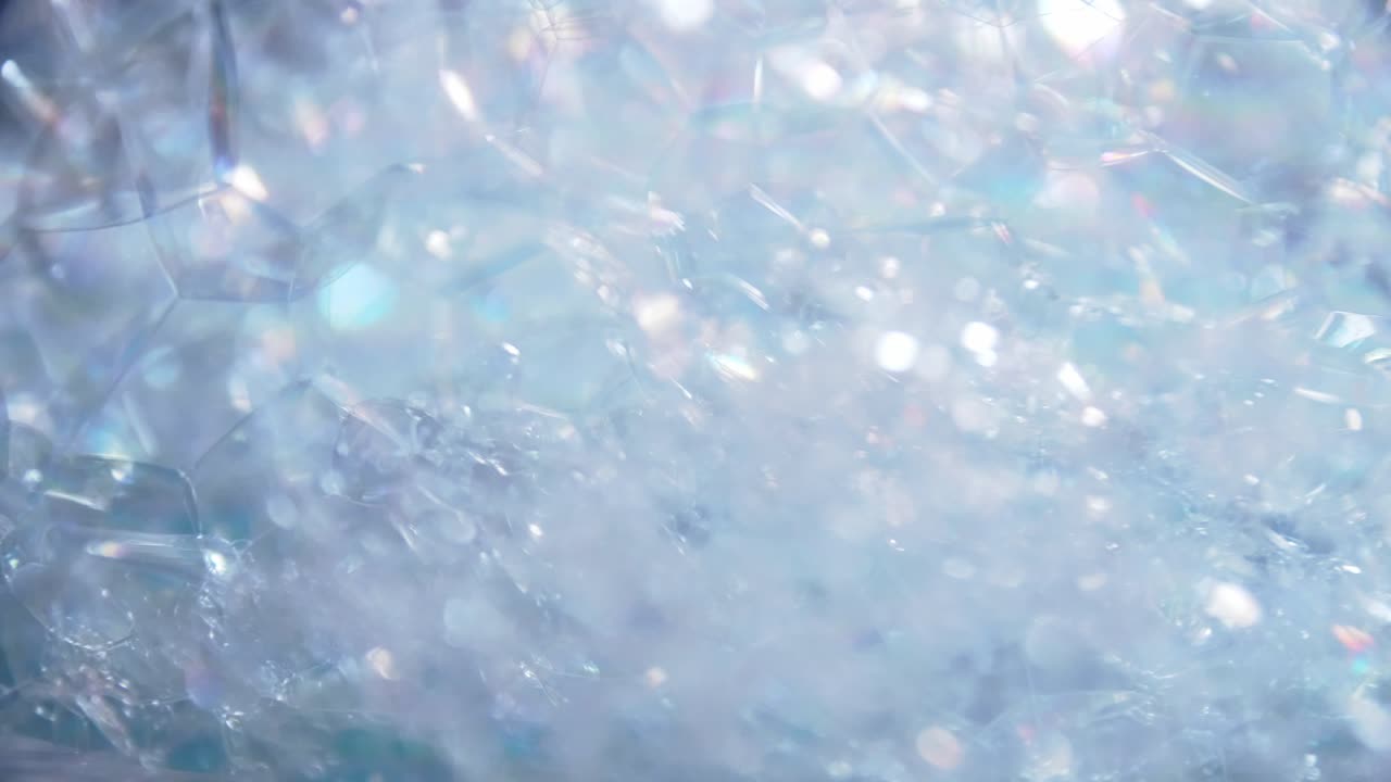 배경 및 디자인을 위해 회전하는 파란색 거품 매크로