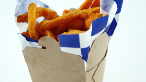 french fried chips in a take away container