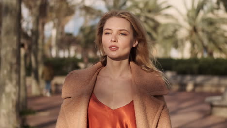 Young-woman-walking-in-the-park.