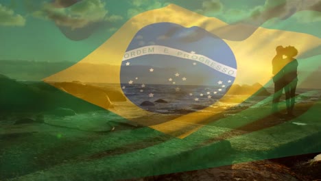 animation of flag of brasil over african american couple at beach