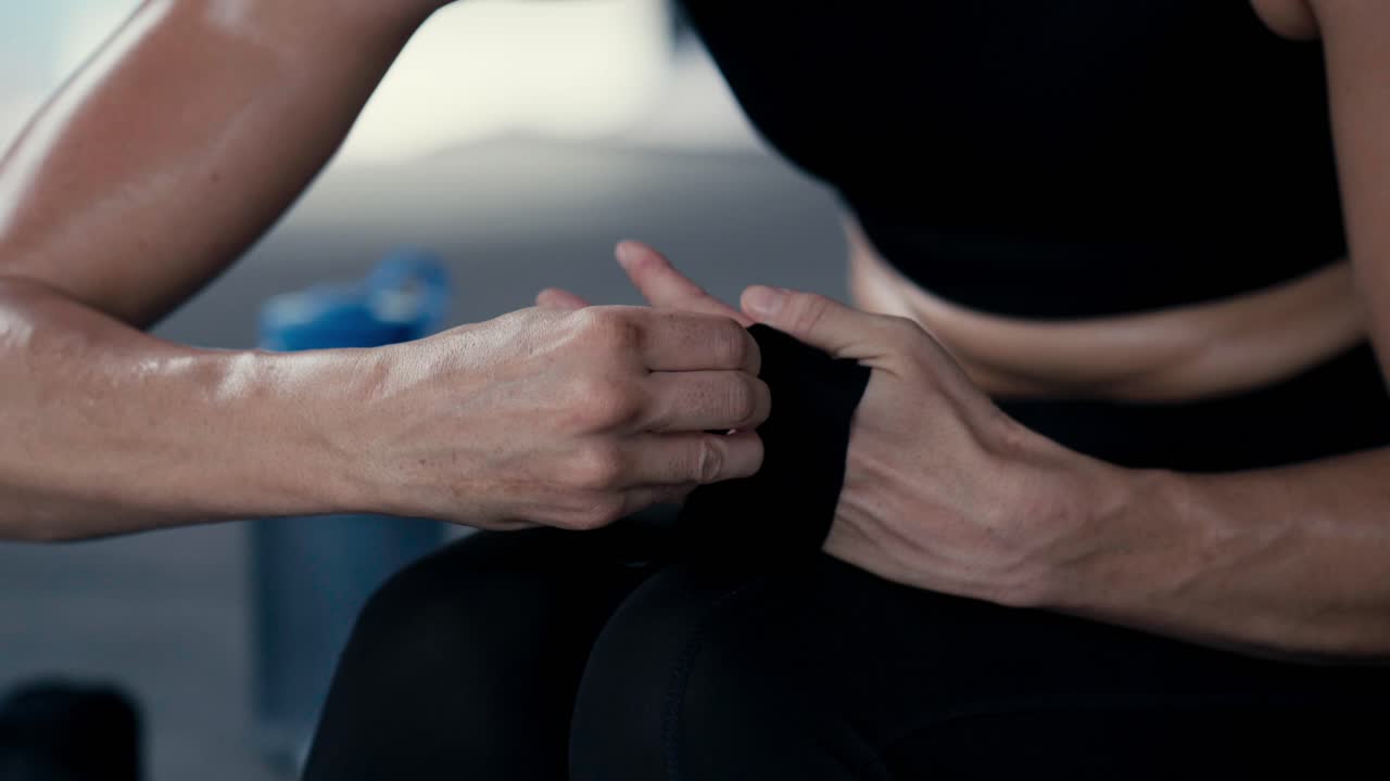 Woman applying wrist support