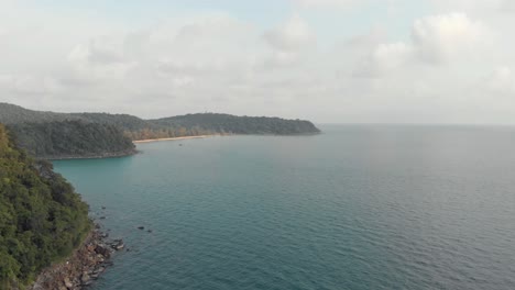 Paradisiac-aerial-view-of-Lazy-Beach,-Koh-Rong-Samloem,-Cambodia