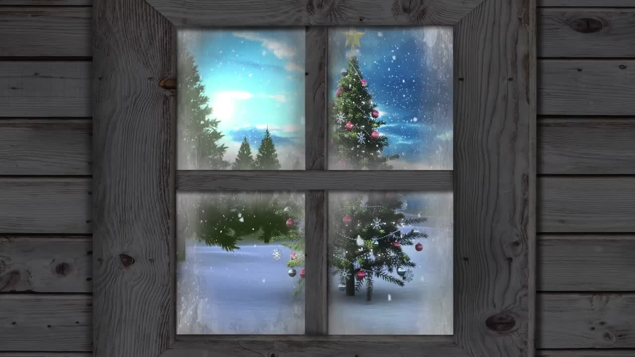 Wooden window frame against snow falling over christmas tree on winter landscape