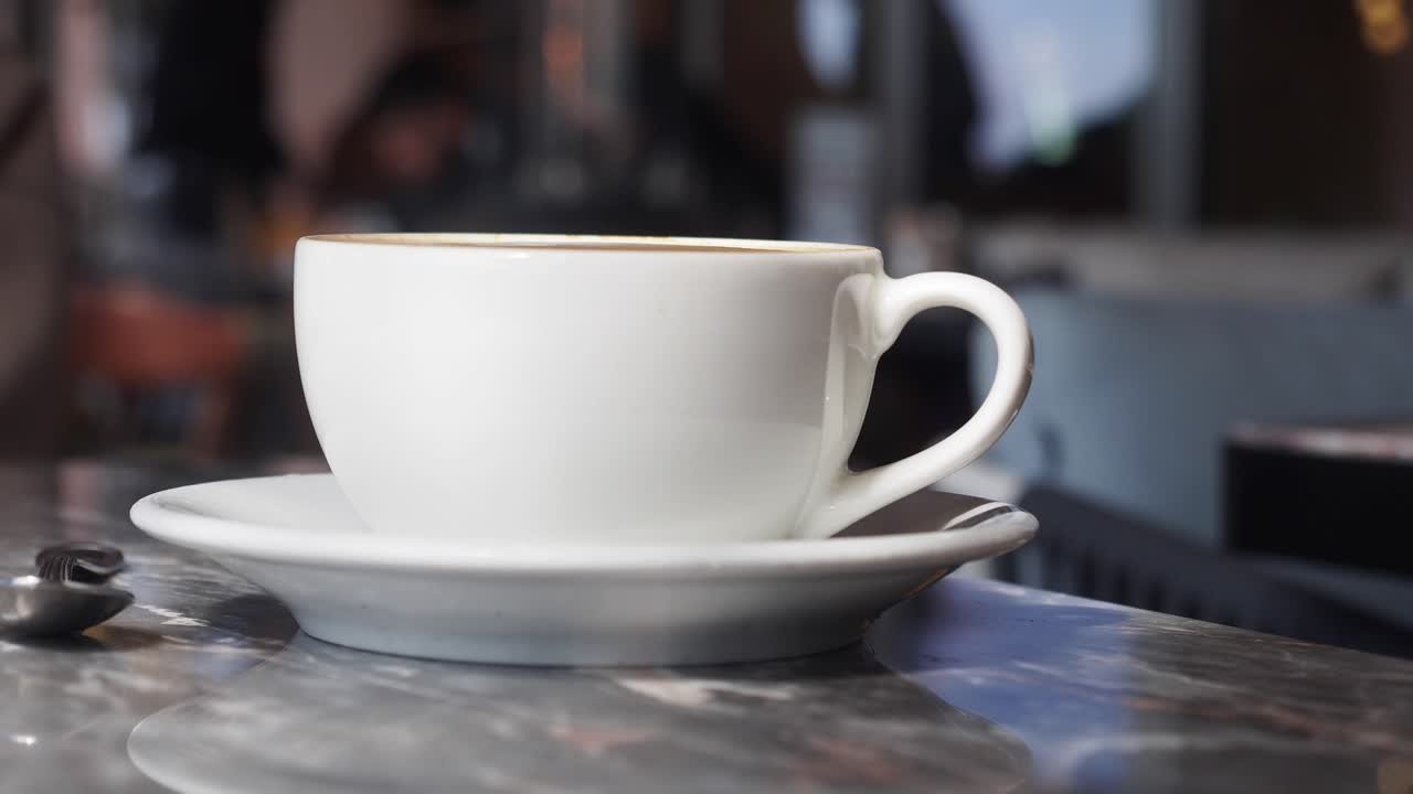 A White Coffee Cup on a Marble Counter