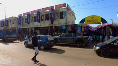 traffic road in front of main entrance serekunda market