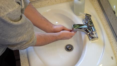 high angle of a person demonstrating the modern hand washing routine