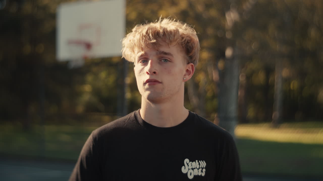 Young Man on a Basketball Court