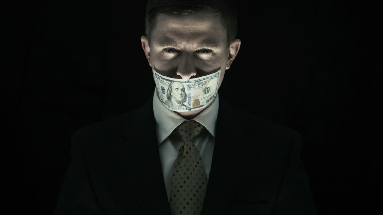 Person With Scary Face Close Mouth a 100 dollars (Stock Footage)