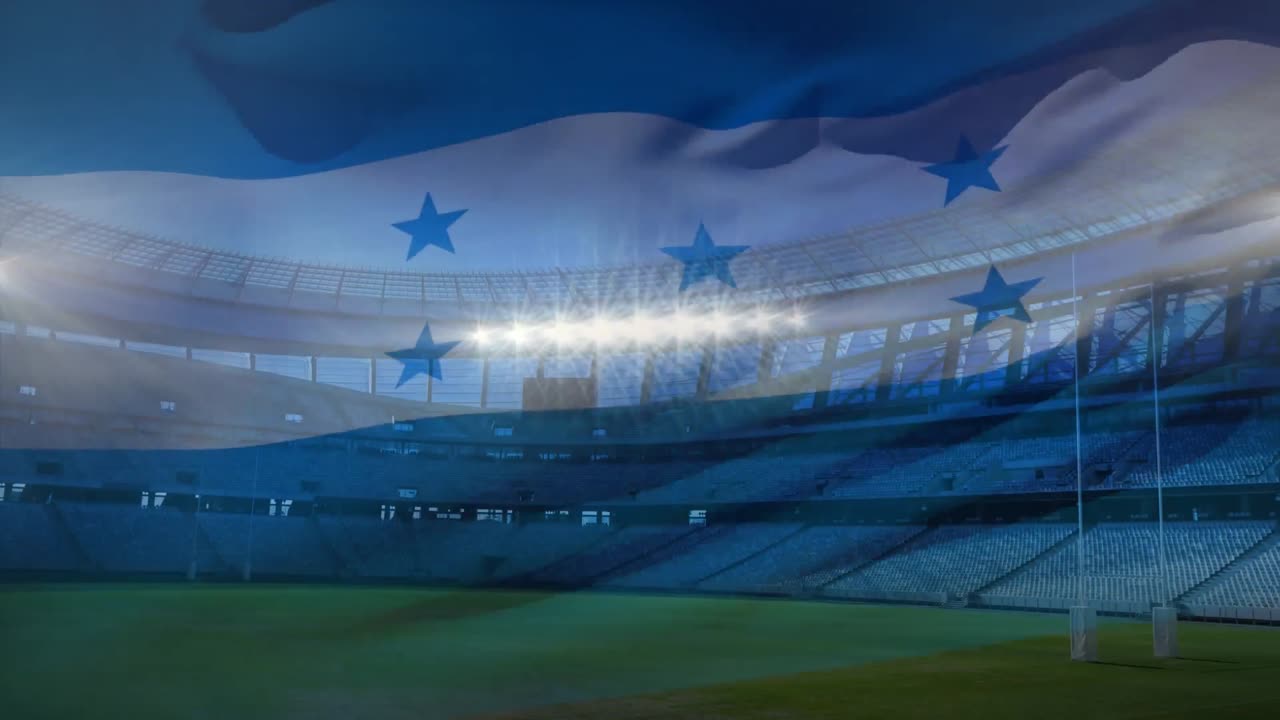 bandera ondeando frente a un estadio