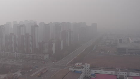 extreme smog envelops tianjin's industrial zone