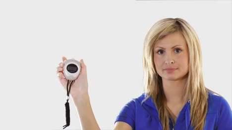 woman holding a stop watch