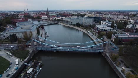 rushed traffic on the grunwaldzki bridge in wrocław, poland, from a drone perspective